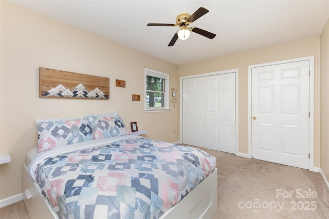 bedroom featuring baseboards, carpet, and ceiling fan