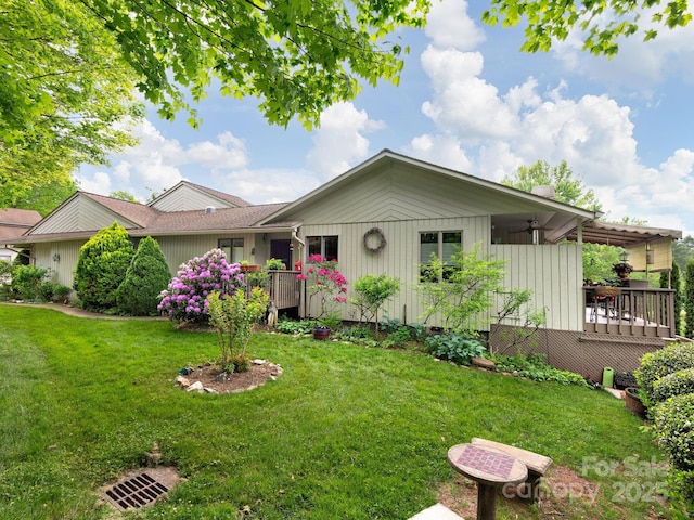 112 Deerlake Dr, Asheville, NC 28803 - ranch-style house with a front yard and a deck