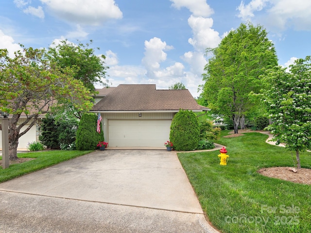 112 Deerlake Dr, Asheville, NC 28803 - view of front of property featuring a front lawn, driveway, a shingled roof, and a garage