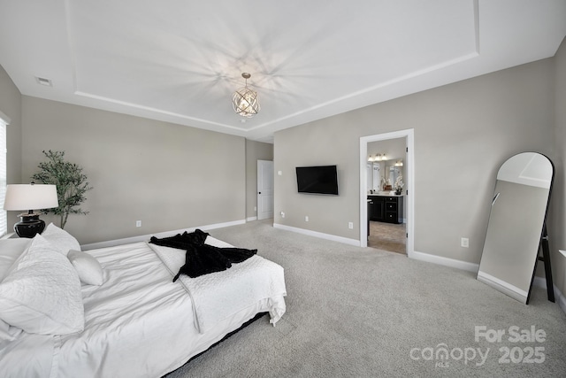 1001 Emory Ln, Fort Mill, SC 29708 - bedroom with a raised ceiling, baseboards, light colored carpet, and ensuite bathroom