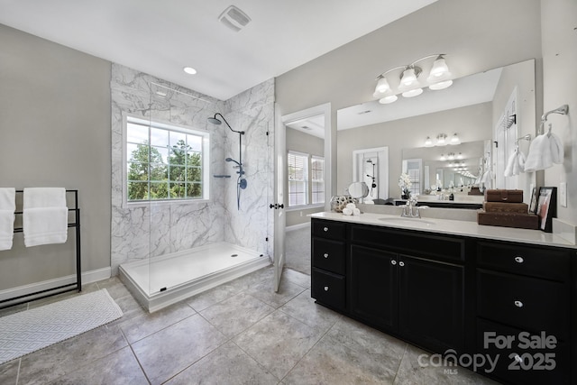 1001 Emory Ln, Fort Mill, SC 29708 - bathroom featuring a marble finish shower, vanity, baseboards, and tile patterned flooring