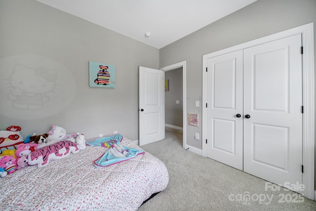 1001 Emory Ln, Fort Mill, SC 29708 - bedroom featuring light colored carpet, a closet, and baseboards