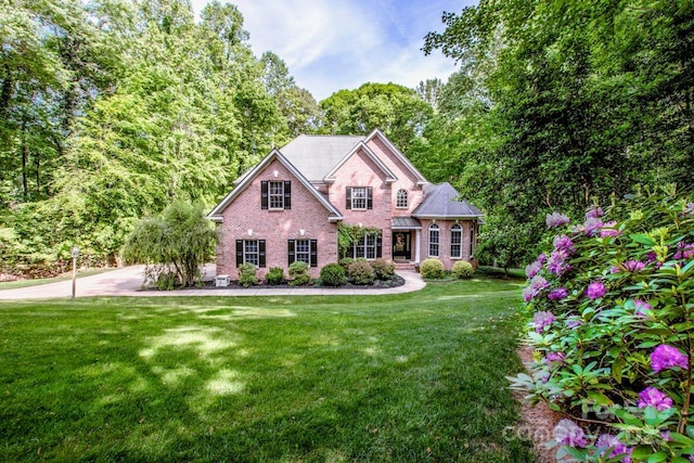 112 Eagle Chase Ln, Troutman, NC 28166 - view of front of property with brick siding and a front lawn
