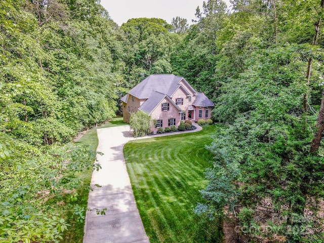112 Eagle Chase Ln, Troutman, NC 28166 - aerial view of property and surrounding area with a forest