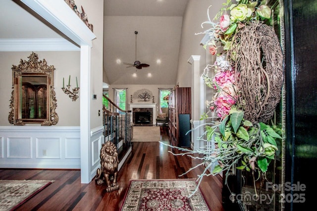 112 Eagle Chase Ln, Troutman, NC 28166 - foyer entrance featuring wood finished floors, ceiling fan, stairs, a towering ceiling, and wainscoting