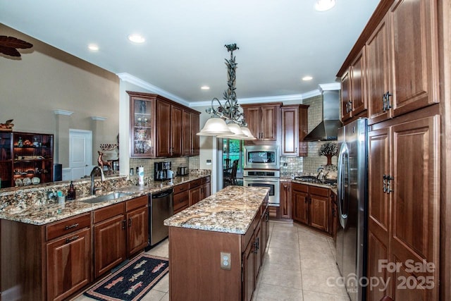 112 Eagle Chase Ln, Troutman, NC 28166 - kitchen with stainless steel appliances, wall chimney exhaust hood, a sink, tasteful backsplash, and light stone counters