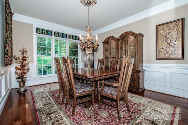 112 Eagle Chase Ln, Troutman, NC 28166 - dining space featuring a chandelier, crown molding, wood finished floors, a wainscoted wall, and a decorative wall