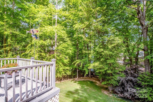 112 Eagle Chase Ln, Troutman, NC 28166 - view of green lawn featuring a wooden deck
