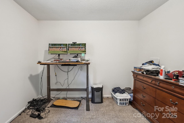office featuring baseboards and carpet