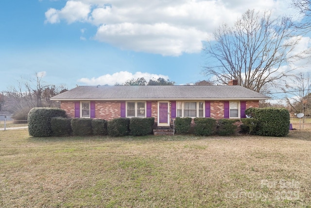 1177 Craigbrow Cir, Chester, SC 29706 - ranch-style house with a chimney, a front lawn, and brick siding
