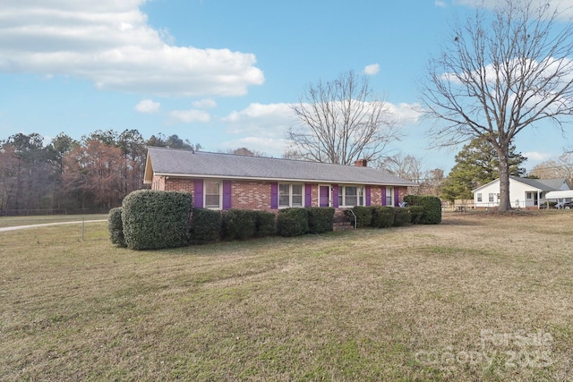 1177 Craigbrow Cir, Chester, SC 29706 - ranch-style home with brick siding, a chimney, and a front yard