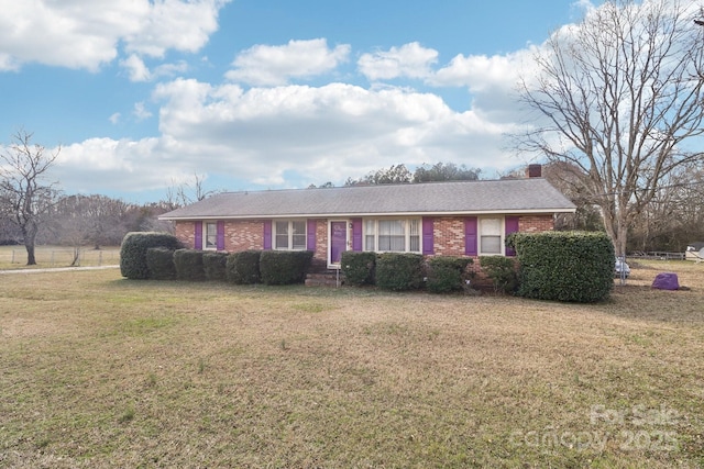 1177 Craigbrow Cir, Chester, SC 29706 - ranch-style house featuring a chimney, a front lawn, and brick siding