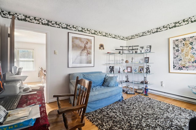 1177 Craigbrow Cir, Chester, SC 29706 - living area with baseboard heating, baseboards, and wood finished floors