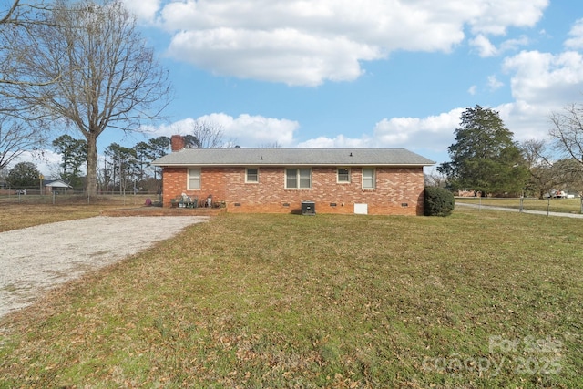 1177 Craigbrow Cir, Chester, SC 29706 - back of house featuring a lawn, a chimney, brick siding, and crawl space