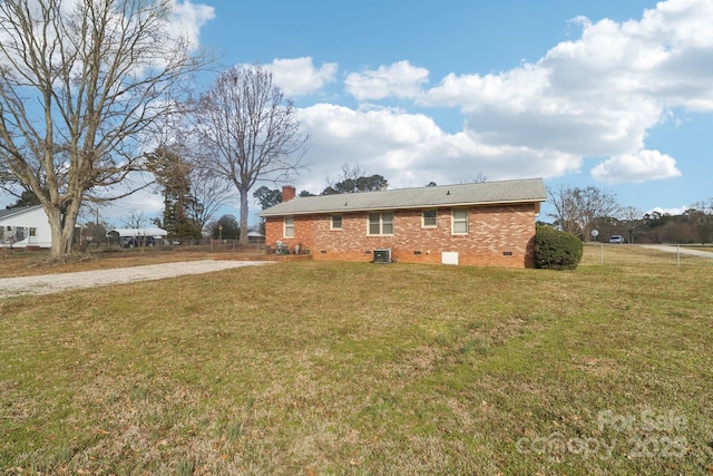 1177 Craigbrow Cir, Chester, SC 29706 - exterior space featuring driveway, a chimney, brick siding, crawl space, and a yard