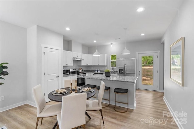 1914 White St Unit A & B, Gastonia, NC 28052 - dining space featuring baseboards, light wood-type flooring, and recessed lighting
