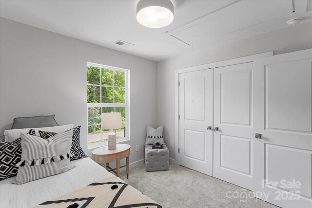 1914 White St Unit A & B, Gastonia, NC 28052 - bedroom with a closet, attic access, visible vents, light carpet, and baseboards
