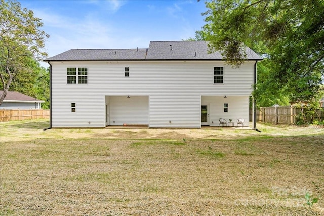 1914 White St Unit A & B, Gastonia, NC 28052 - rear view of house with a lawn, a patio area, and fence