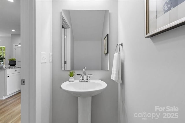 1914 White St Unit A & B, Gastonia, NC 28052 - bathroom with recessed lighting, a sink, and wood finished floors