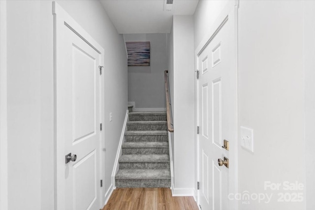 1914 White St Unit A & B, Gastonia, NC 28052 - stairway featuring baseboards, visible vents, and wood finished floors
