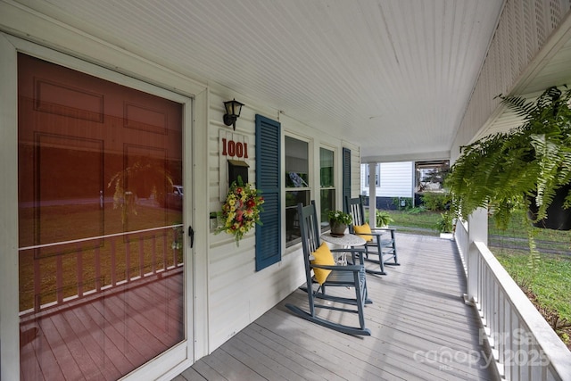 1001 Old Charlotte Rd, Concord, NC 28027 - wooden deck with covered porch