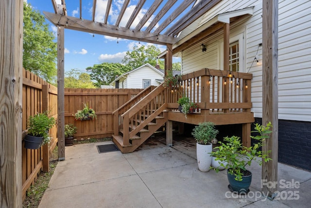 1001 Old Charlotte Rd, Concord, NC 28027 - view of patio / terrace featuring a wooden deck, a fenced backyard, and a pergola