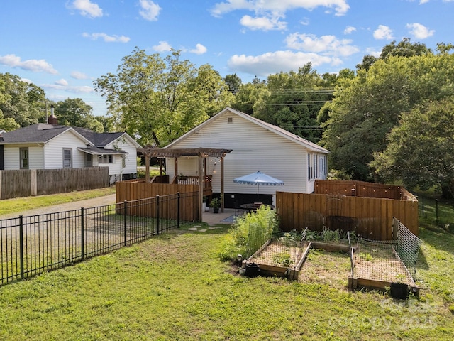 1001 Old Charlotte Rd, Concord, NC 28027 - back of property with a vegetable garden and a pergola