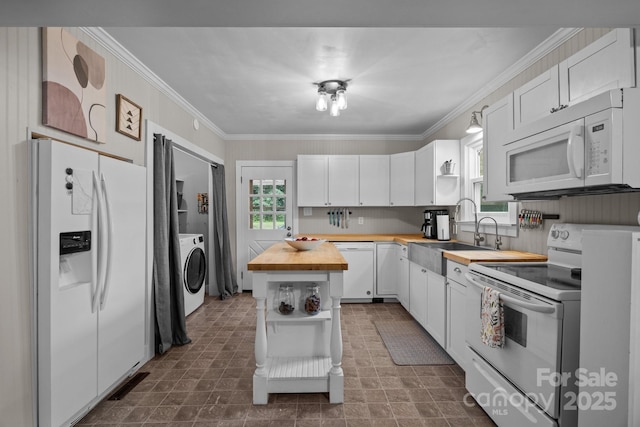 1001 Old Charlotte Rd, Concord, NC 28027 - kitchen featuring butcher block countertops, white appliances, washer / clothes dryer, a sink, and open shelves