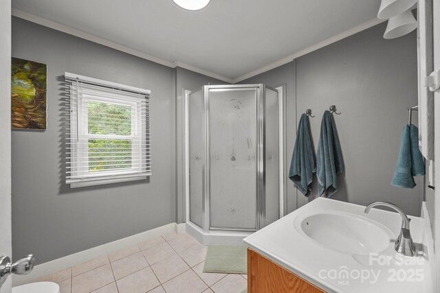 1001 Old Charlotte Rd, Concord, NC 28027 - full bathroom featuring crown molding, a stall shower, tile patterned flooring, vanity, and baseboards