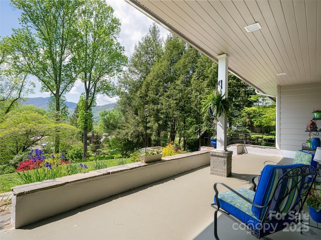 view of patio featuring a mountain view