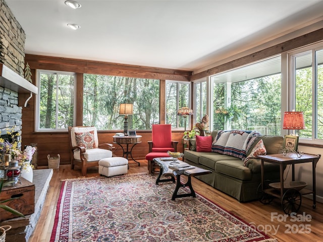 sunroom with wood finished floors