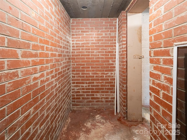 hall with brick wall