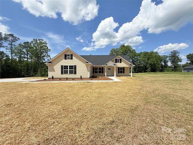 view of front of house with a front lawn