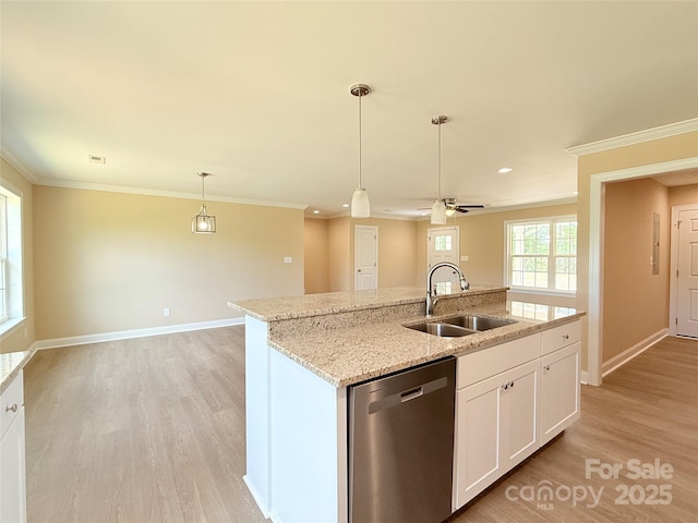 kitchen with baseboards, a sink, light wood-style flooring, and dishwasher