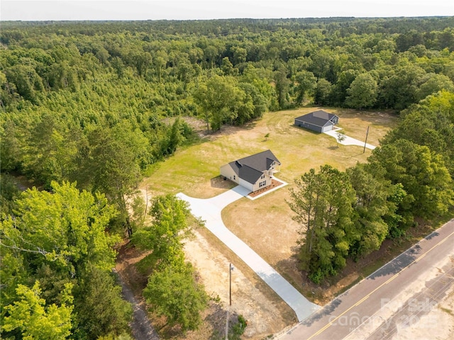 3650 Sentry Rd, Lancaster, SC 29720 - aerial view of property and surrounding area featuring a heavily wooded area
