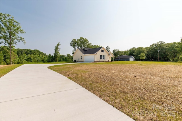 3650 Sentry Rd, Lancaster, SC 29720 - view of front of property featuring a front lawn, concrete driveway, and a garage