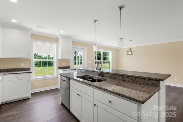 3650 Sentry Rd, Lancaster, SC 29720 - kitchen featuring dishwasher, dark wood-style flooring, ornamental molding, white cabinets, and dark stone counters