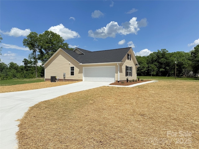 3650 Sentry Rd, Lancaster, SC 29720 - view of home's exterior with concrete driveway, an attached garage, and a lawn