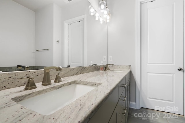 bathroom featuring double vanity