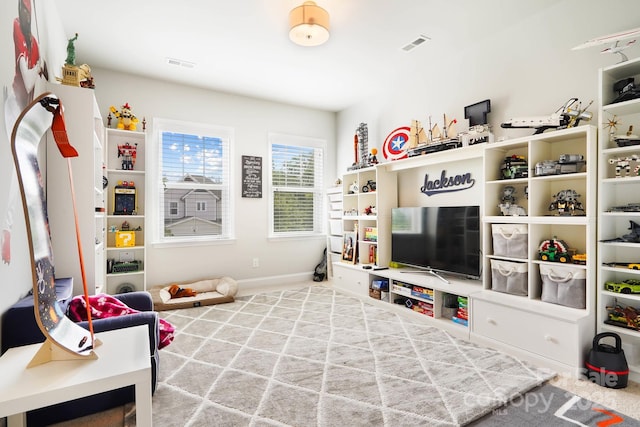 recreation room featuring baseboards