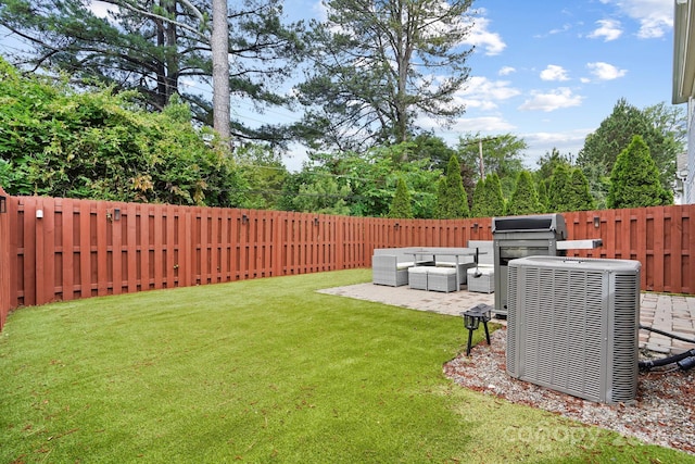 view of yard featuring an outdoor hangout area, central AC unit, and a patio area