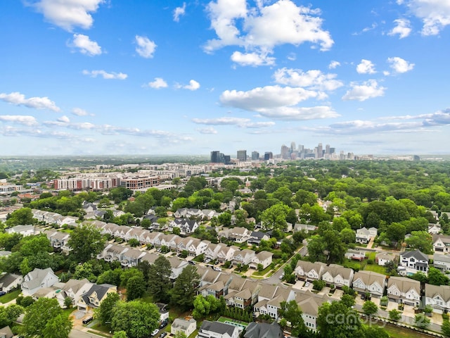 aerial perspective of suburban area featuring a view of skyline