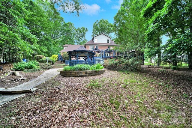 8524 Quarters Ln, Mint Hill, NC 28227 - view of yard with a gazebo and a deck