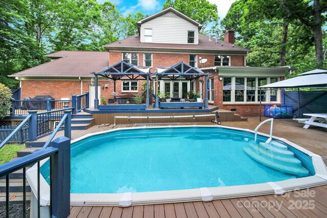 8524 Quarters Ln, Mint Hill, NC 28227 - outdoor pool with a wooden deck and a gazebo