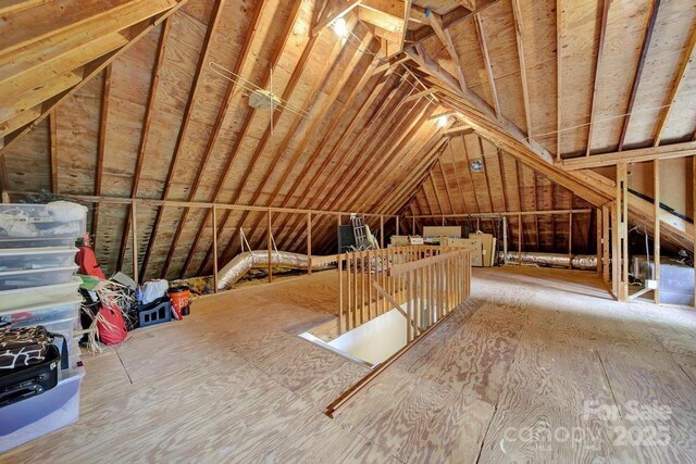 8524 Quarters Ln, Mint Hill, NC 28227 - attic featuring an upstairs landing