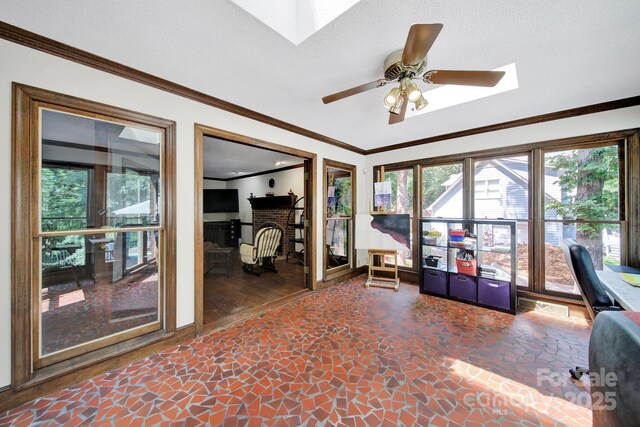 8524 Quarters Ln, Mint Hill, NC 28227 - office space featuring a skylight, a brick fireplace, plenty of natural light, stone finish floors, and crown molding