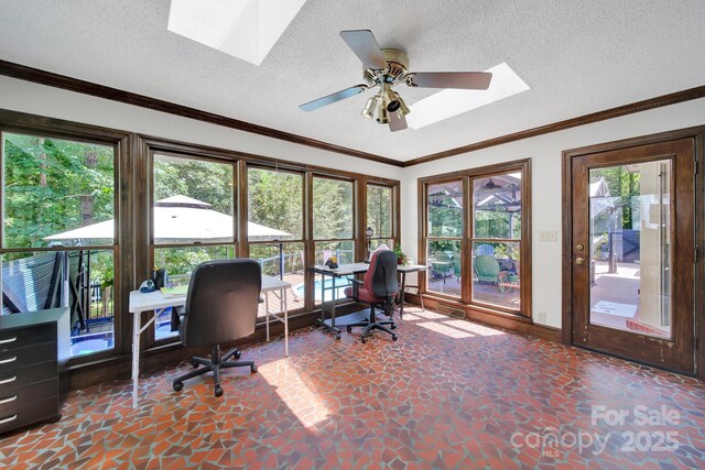 8524 Quarters Ln, Mint Hill, NC 28227 - home office with a skylight, stone floors, ceiling fan, and a textured ceiling