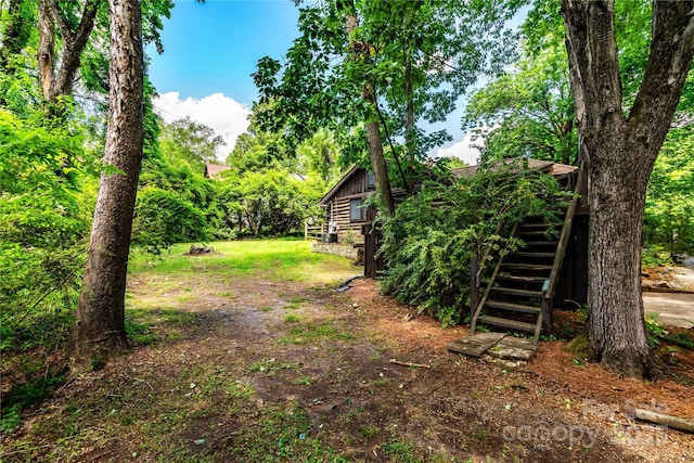 view of yard with stairs