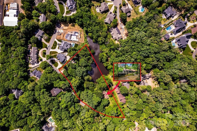 aerial view of residential area with property boundaries highlighted