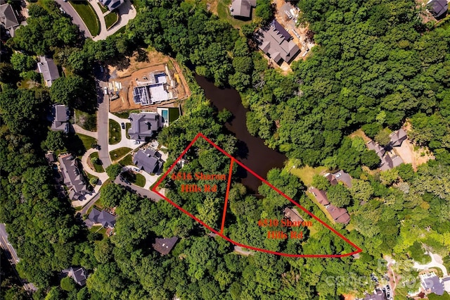 aerial view of residential area featuring property parcel outlined